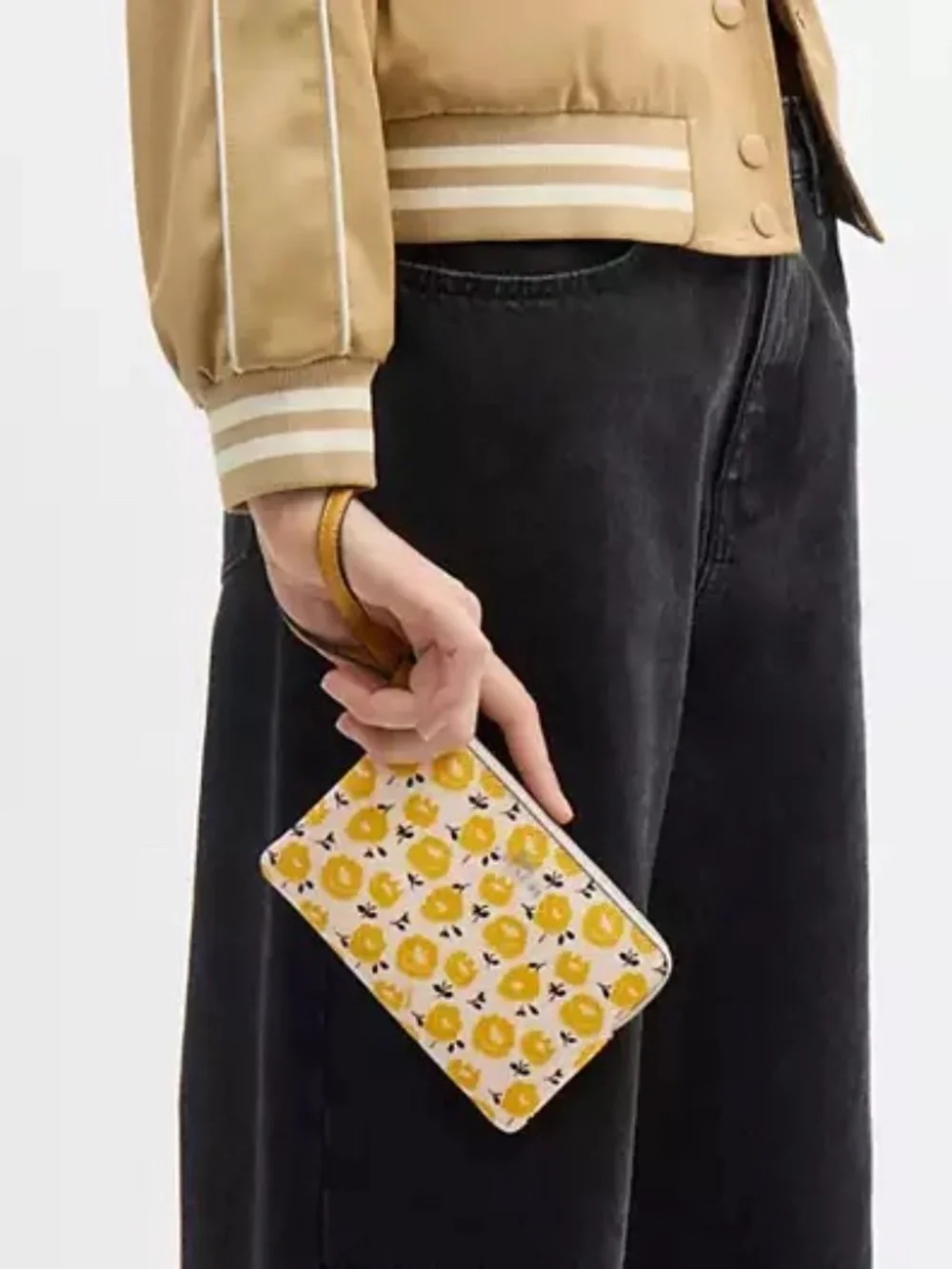 Coach wristlet with floral print